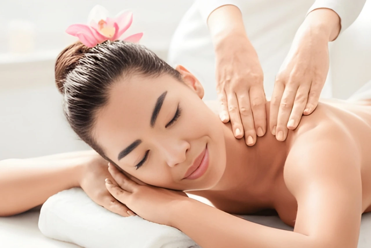 Therapist providing traditional Thai stretching and relaxation massage