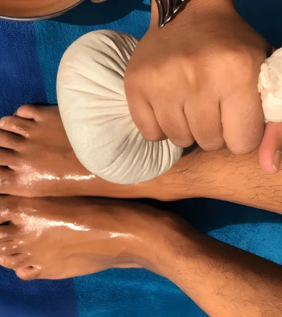 Potli massage therapy using herbal compress for pain relief and relaxation